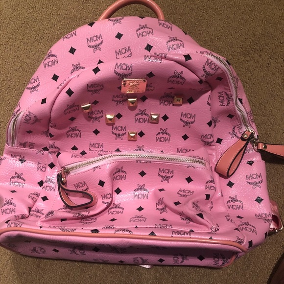 mcm pink luggage